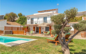 Beautiful home in Mezquitilla with Outdoor swimming pool, WiFi and 3 Bedrooms